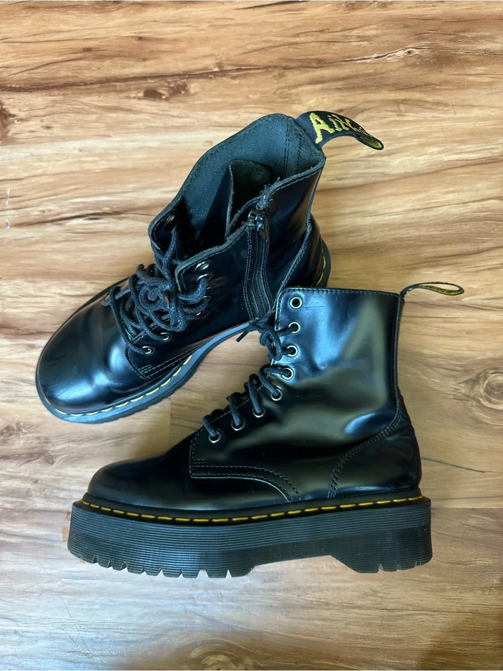 Dr. Martens Black Leather Platform Combat Boots with Yellow Stitching